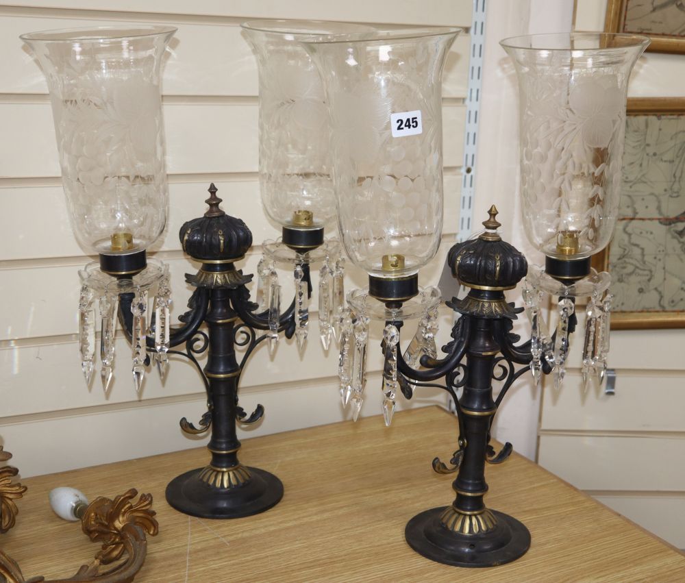 A pair of two branch table lamps, with etched glass shades and crystal drops, overall height 56cm